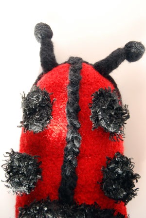 felted ladybug fiber trend clogs close up of knitting crochet ornaments decorations antennae dots