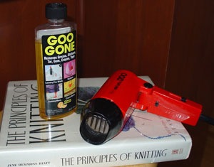 use goo gone and hair dryer to remove sticky glue residue from books