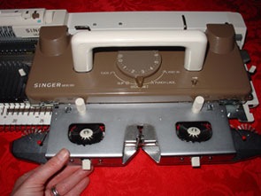 how to set up a knitting machine secure sinker plate assembly to carriage