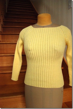 inknitters yellow trenzado machine knit ribbed raglan sweater on dressform mannequin with headlights
