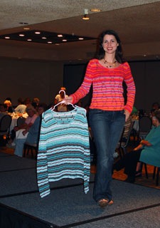 Tricia Shafer modeling sweaters at Needle-Tek knitting machine seminar